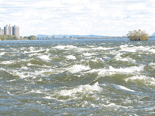 Lachine Rapids with Nun's Island and the Champlain Bridge in the background
